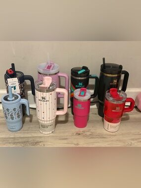 Stanley assorted colorful insulated tumblers and mugs - pink, red, black, blue